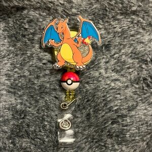 Charizard Badge Reel with Poké Ball Charm